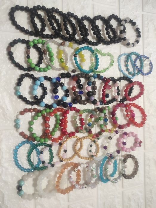 Продам браслеты с бусинами дзи и т.д.
