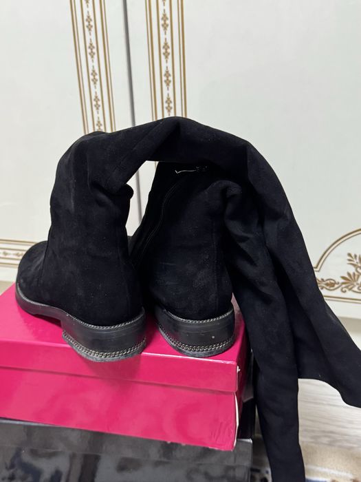 Черные длинные сапоги