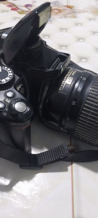 NIKON D3000 sotiĺadi