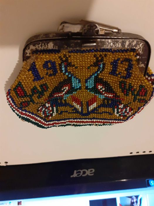 Старо портмоне на 112 години