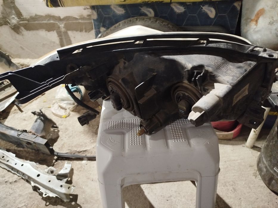 Фара левая Раф4(3пок) рестаил2012 Америка