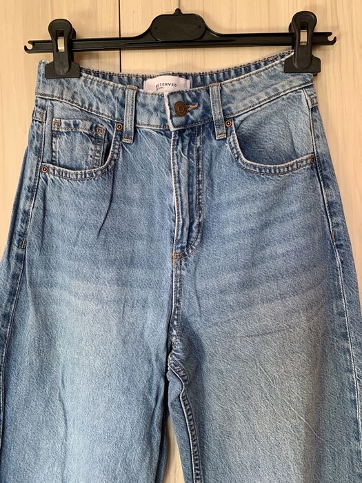 Дънки с подгънати широки крачоли