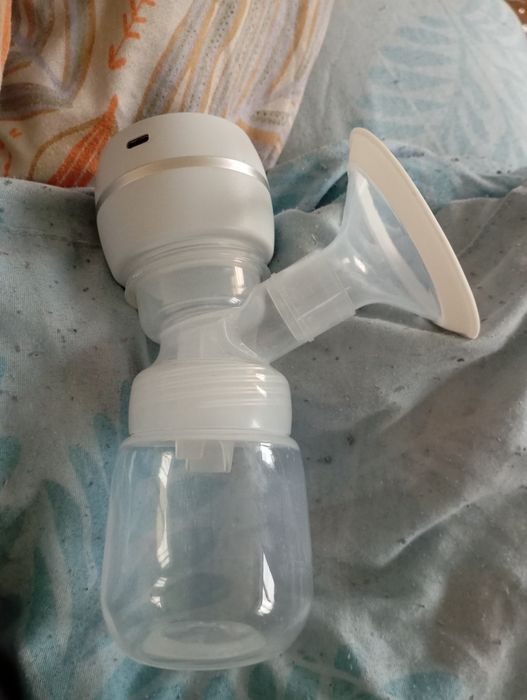 Продам молокоотсос электрический