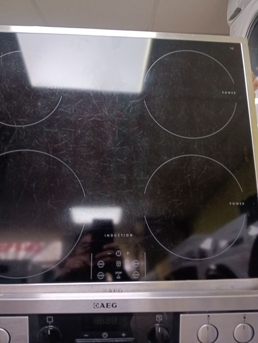 Иноксова печка за вграждане с индукционни котлони Аег Aeg  с Гаранция