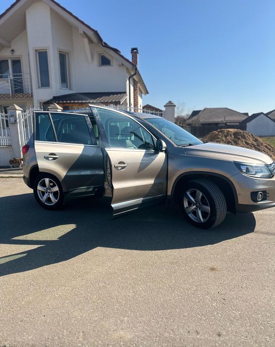 Vând s-au schimb Tiguan