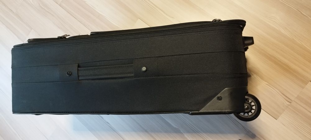 Нов куфар с колелца