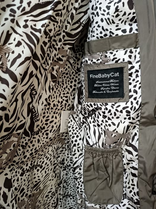 Продам пуховик серого цвета