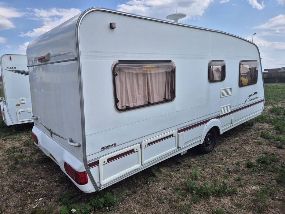 Rulota Swift Carisma 2006 4/5 locuri