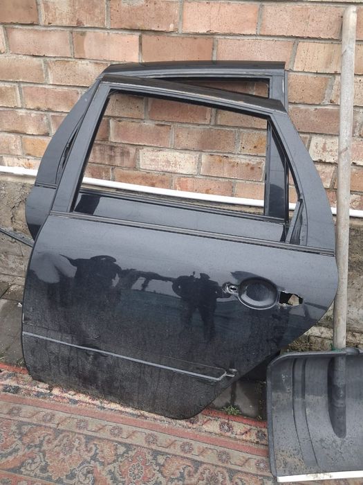 Задние двери лада гранта
