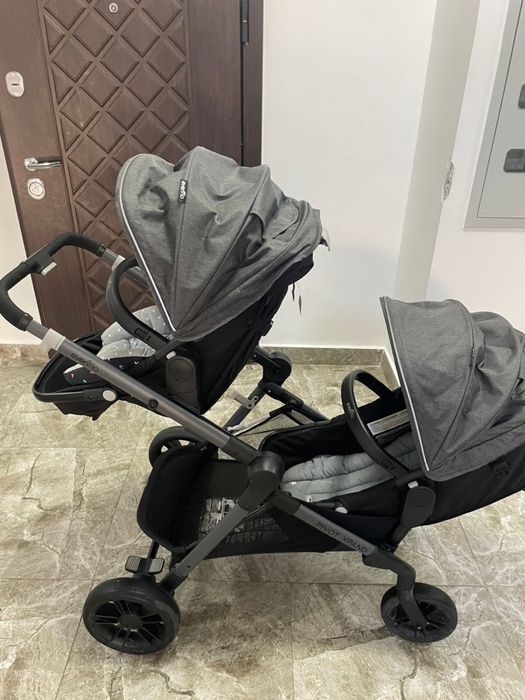 Коляска Evenflo Pivot с двумя прогулочными блоками