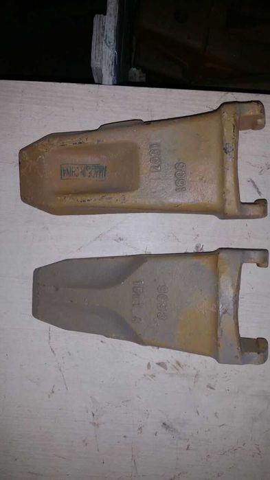 Коронки на экскаваторы caterpillar K