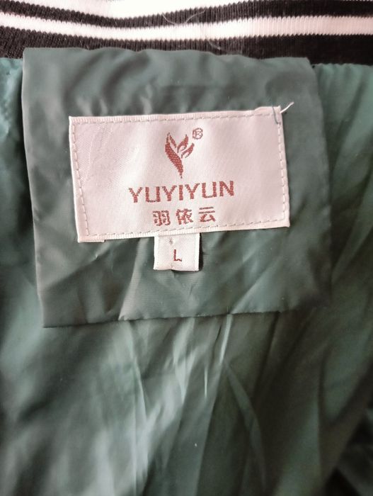 Пуховик женский темно зеленый