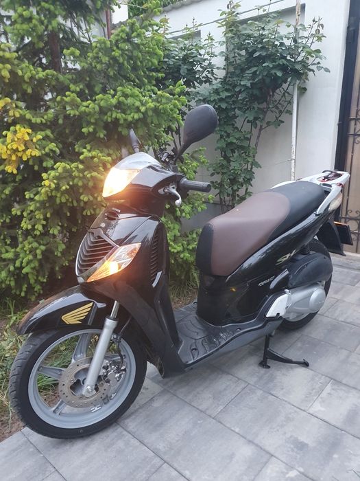 Scuter Honda 125i 11.000 km
