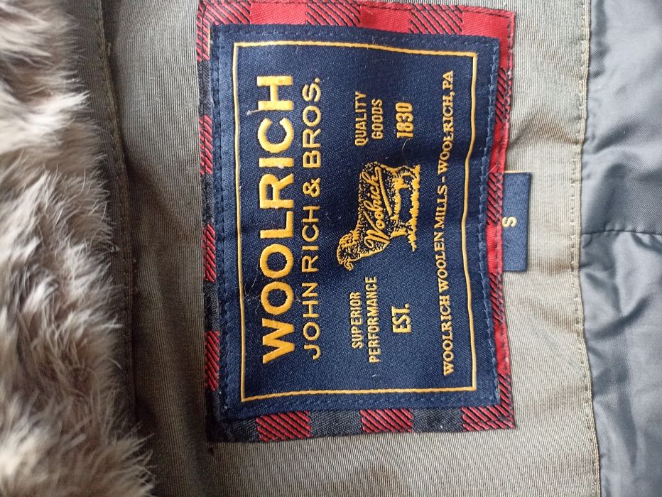 Пухена парка Woolrich за планина и ежедневие