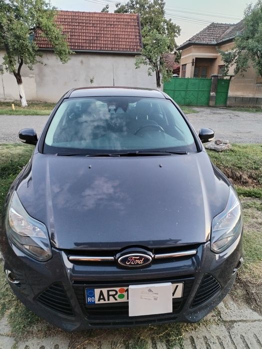 Ford focus anul 2013 diesel, culoarele albastru , genti alumini etc.mob.0729414074