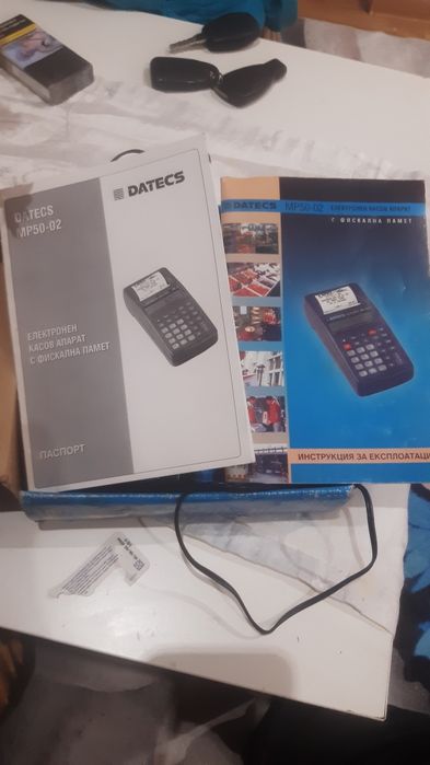 Касов апарат със зарядно
