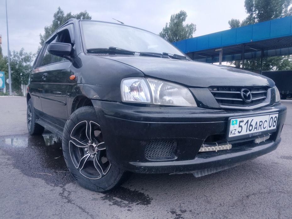 Мазда демио 2002