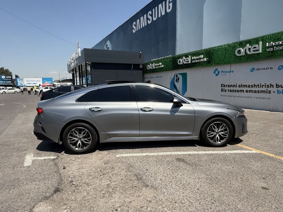 Kia K5 panarama mokriy