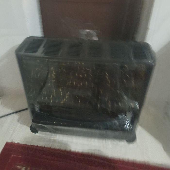 Камин для обогревания и уюта в доме.