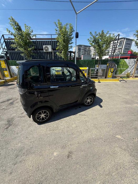 Masina electrica cu scaun confortabil la sofer fara permis move eco x9 neo