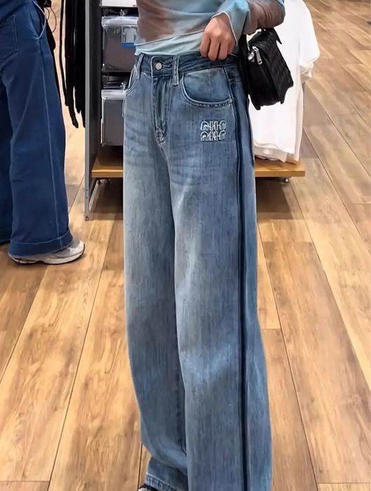 Дънки с камъни и тъмен кант Miu