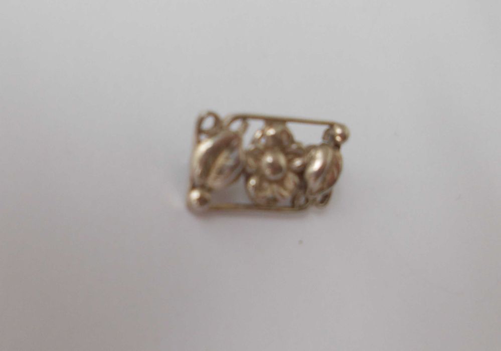 Brosa veche din argint