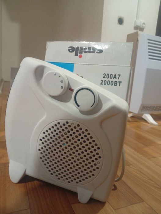 тепловентилятор (электрический обогреватель) бренда Smile.