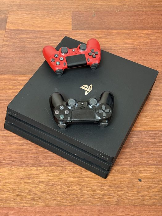 Playstation 4 Pro / 2 джойстика / 4 игры