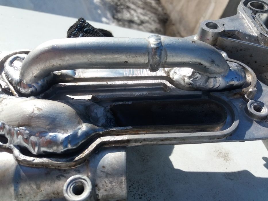 Теплообменник Шевроле Круз .Авео. Прокладка теплообменника Шевроле .