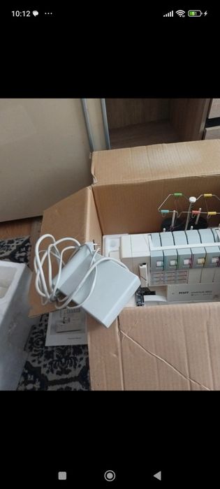 Mașină surfilat-triploc