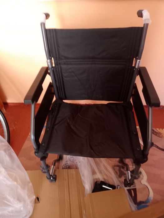 Механическая коляска