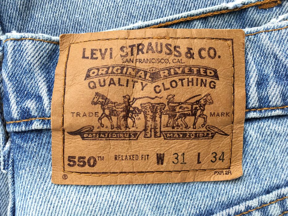VINTAGE 1997 Made in U.S.A. LEVI'S® 550™ Orange Tab™ Jeans — W31 L32