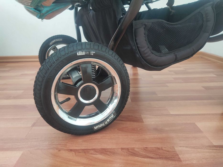 Коляска двухместная