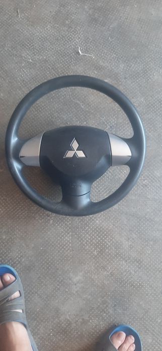 Vând volan mitubishi și capace butuci