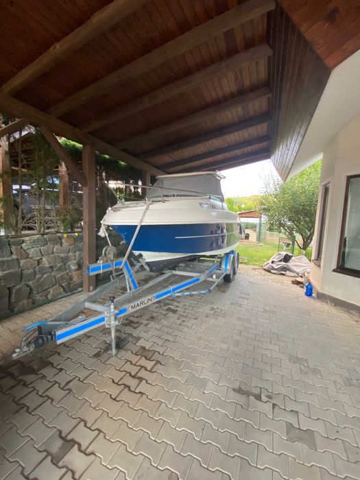 Vând barcă Bluestar Ventura 5,30 m cu cabină + Suzuki 90 CP + peridoc Marlin 2 axe