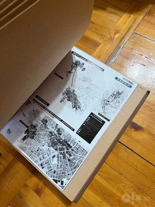 Альбом фотоснимков планов городов Узбекистана.