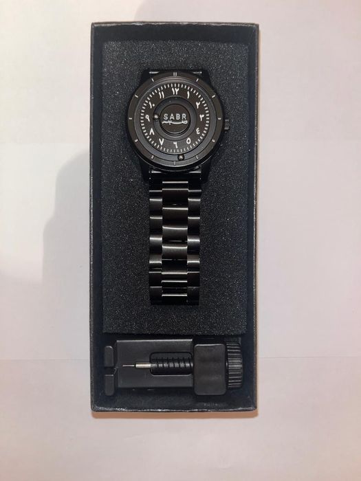 Арабские часы на шариках.