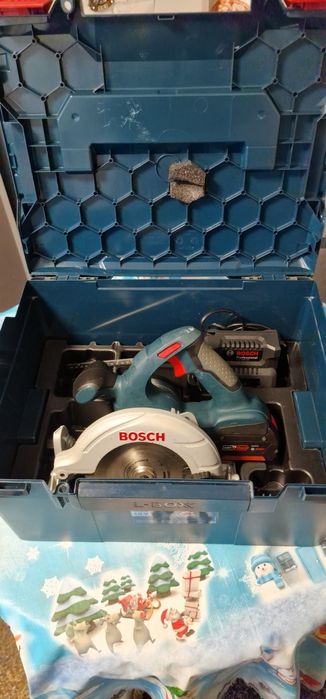 Titlu:Bosch GKS 18V-LI + baterie 4.0Ah + încărcător 18V-20