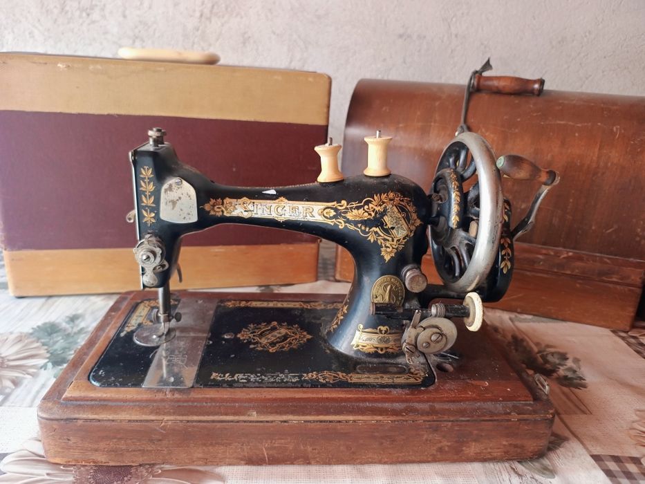 Masini de cusut manuale marca Singer