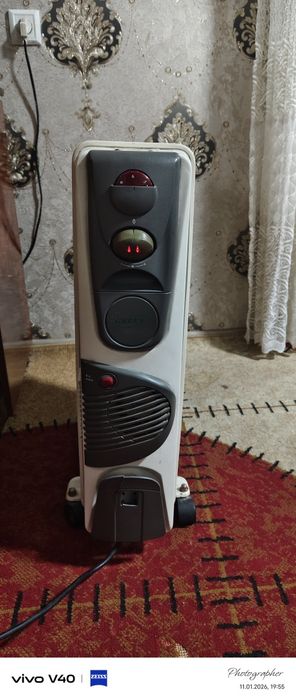 Масляный обогреватель