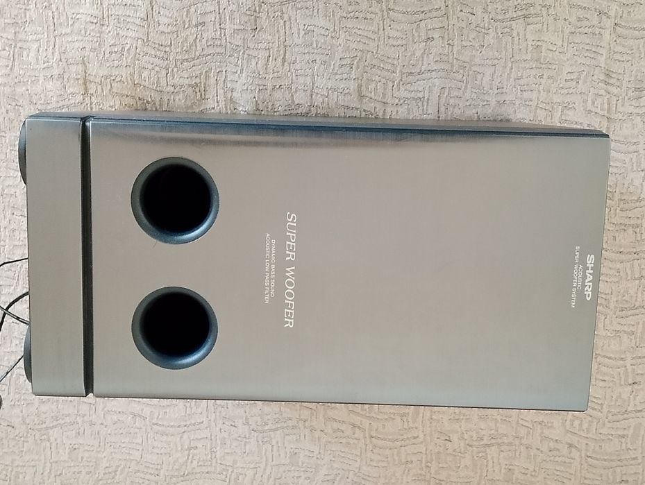 Тонколони Sharp.