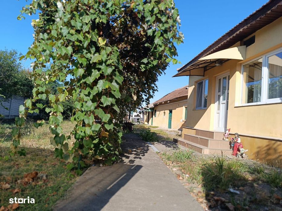 Casa + teren Pielesti deschidere 18m,1100mp,toate utilitatile