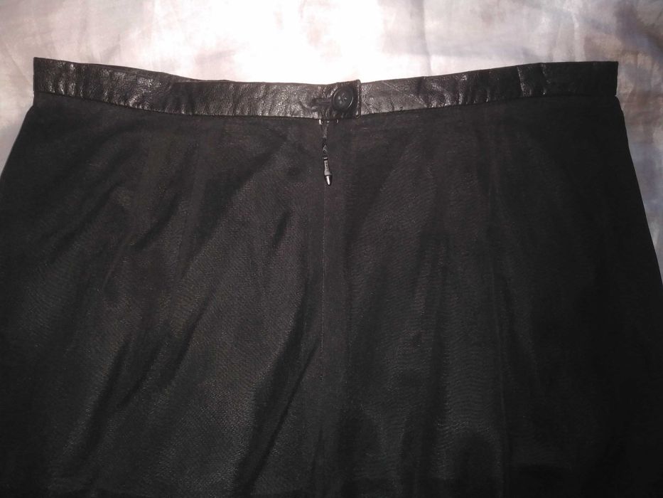 Fusta Noua de la United Colors of Benetton , model foarte frumos, este foarte frumos lucrata, calitativa,  culoare neagra