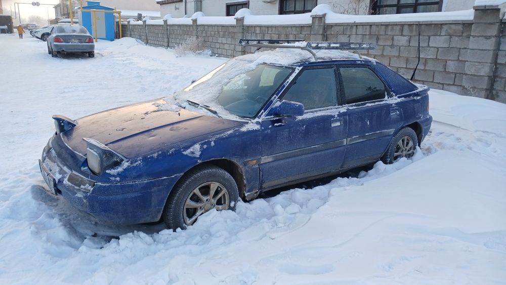 Продам машину Мазда 323