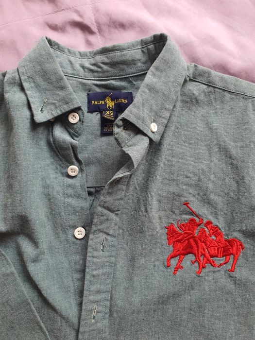 Рубашка Поло новая на мальчика 10 лет.