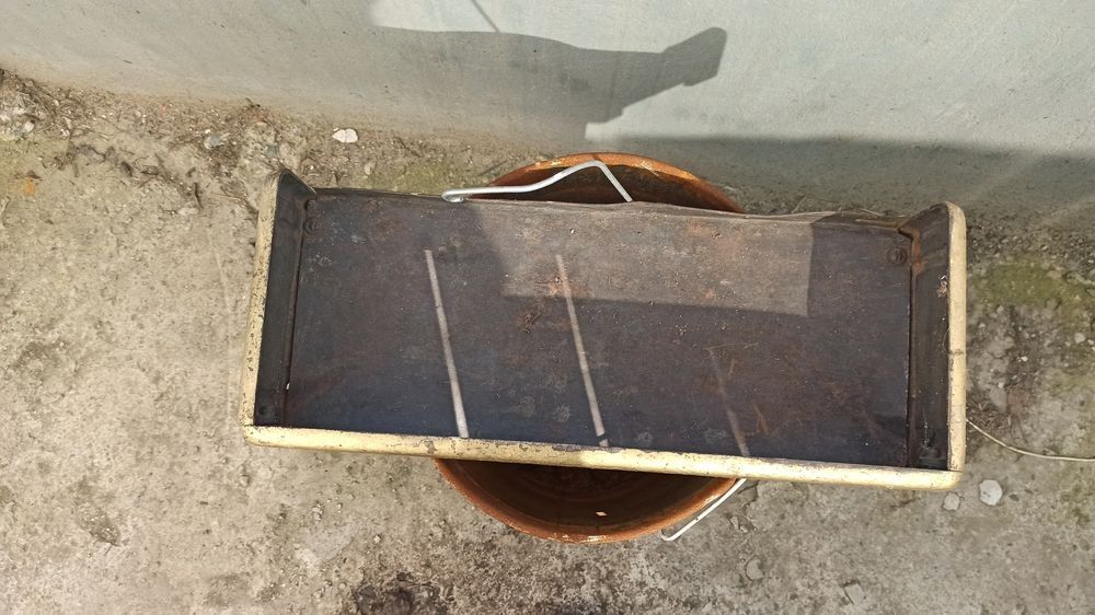 Masca semineu din fonta