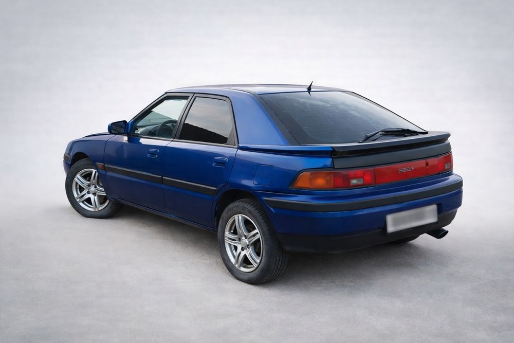 Мазда 323 F Автомобиль