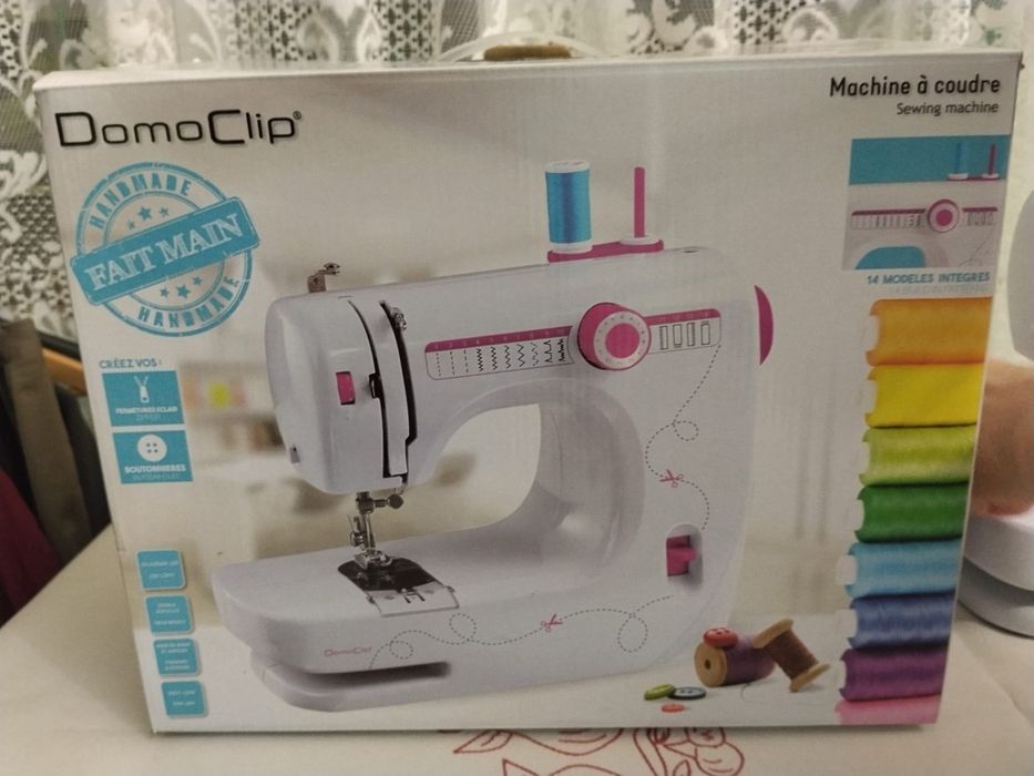 Mașina de cusut DomoClip