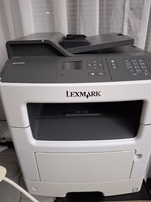 Мултифункционален лазерен принтер Lexmark MX310dn