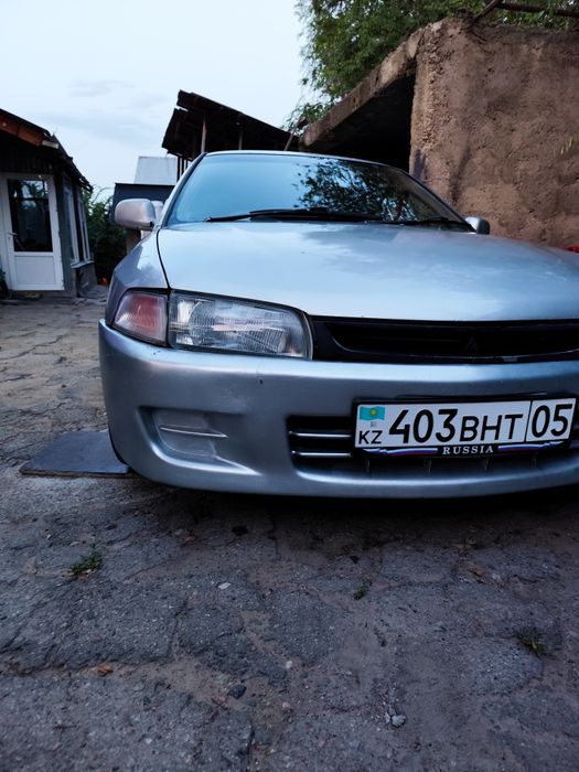 Мицубиси мираж (Лансер)